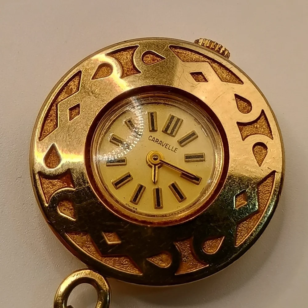 Caravelle Gold Toned Pendant Wind Up Watch